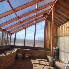Insulated north wall w/16mm clear polycarbonate panels