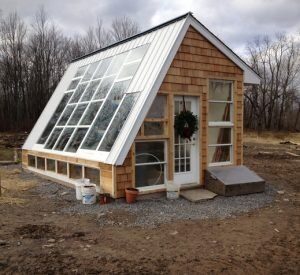 Passive-solar-greenhouse-wood-frame-1--p5n3y3jns2k98yfwgvck8zlsu9a70lkjnjo6ne9i2m
