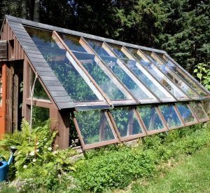 Passive-solar-greenhouse-wood-frame-3--p5n3y3jns2k98yfwgvck8zlsu9a70lkjnjo6ne9i2m